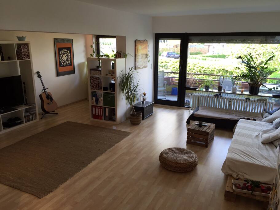 view from kitchen to living room and balcony