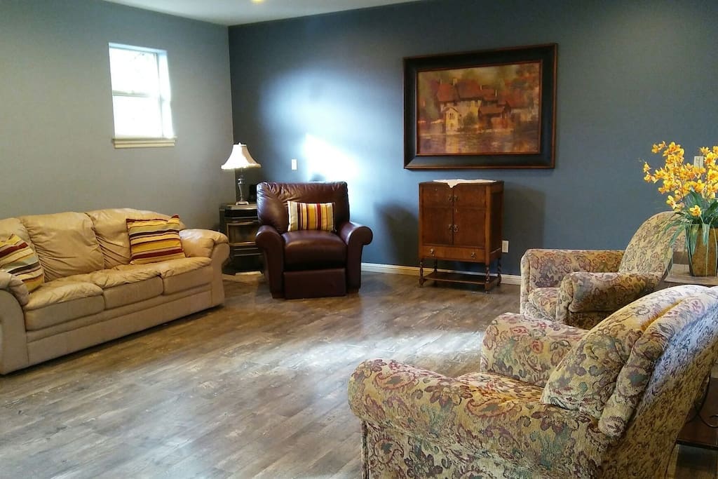 Living Room with cozy seating and space for all.