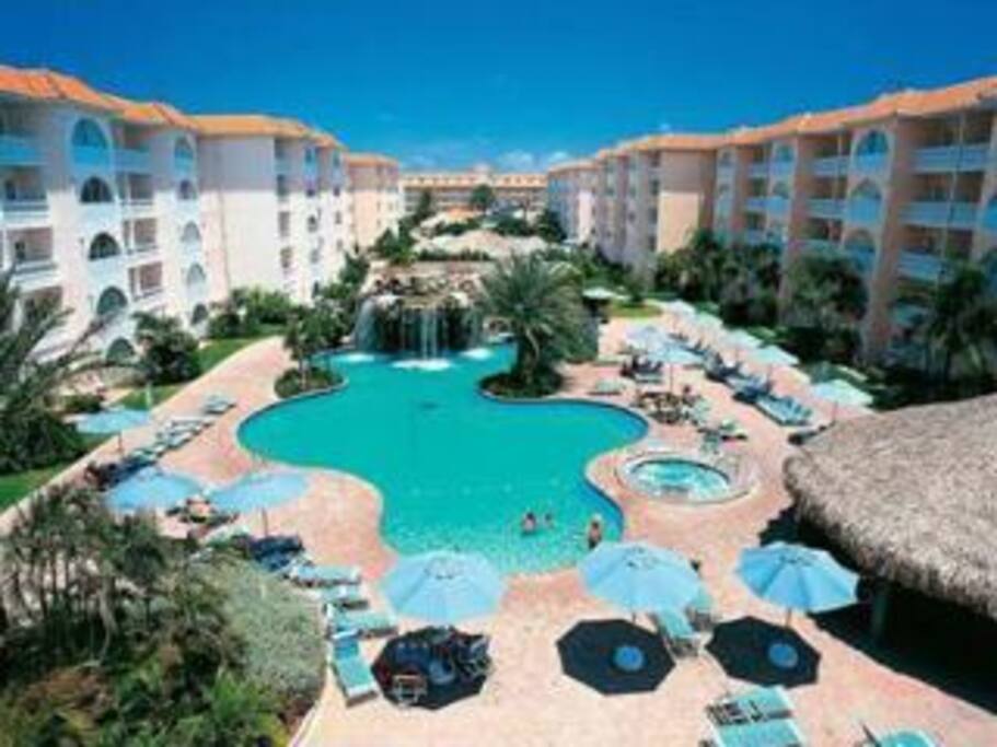 The 'quiet' pool with a waterfall and plenty of shade.. Pull up a palapa and catch some Zzzz'sss..