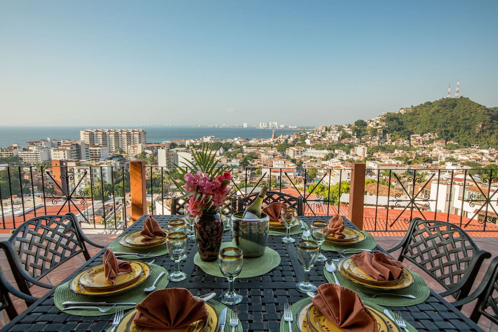 Enjoy 2 meals per day on the large terrace with incredible ocean and city views