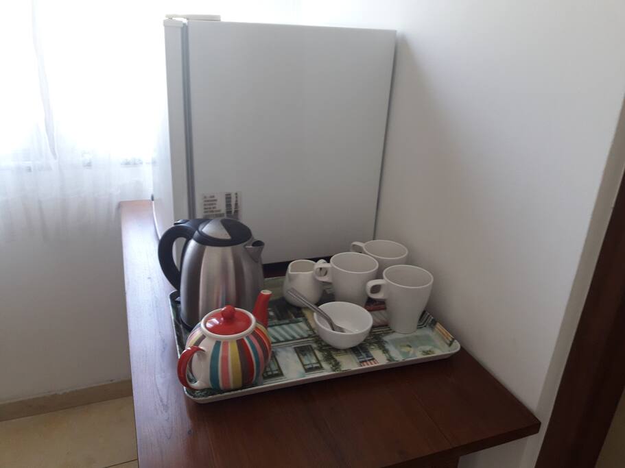 Coffee and tea making facilities with fridge.