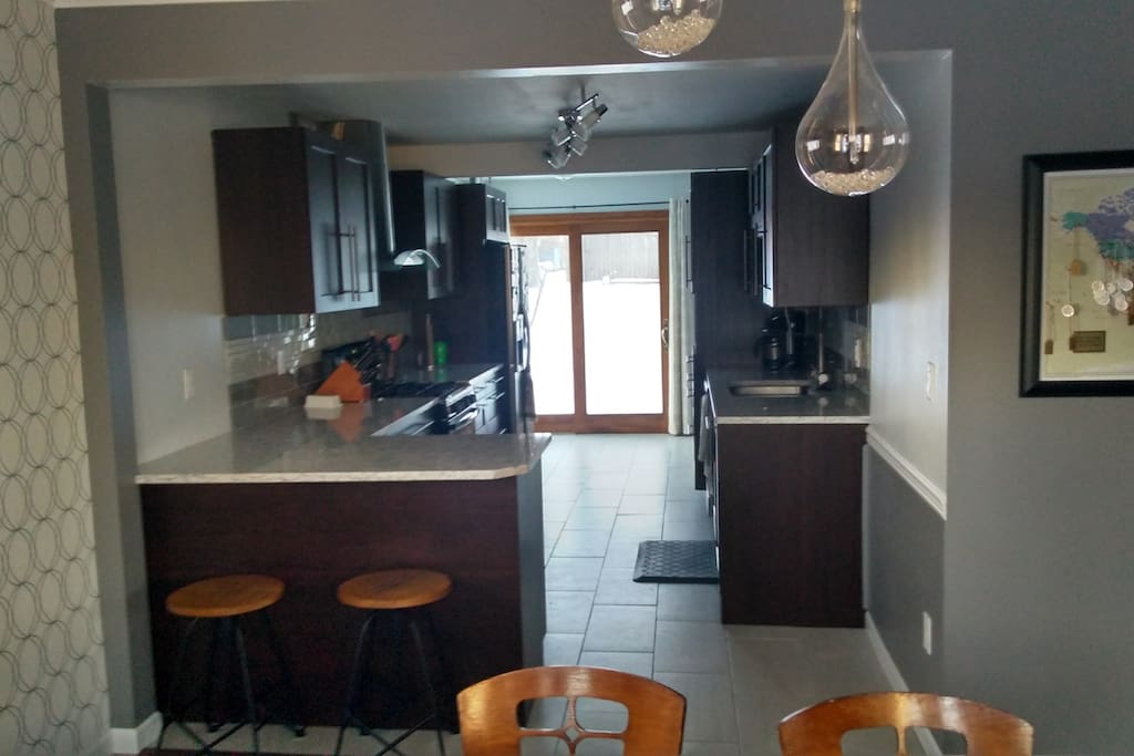 Dining Room into kitchen with bar stools