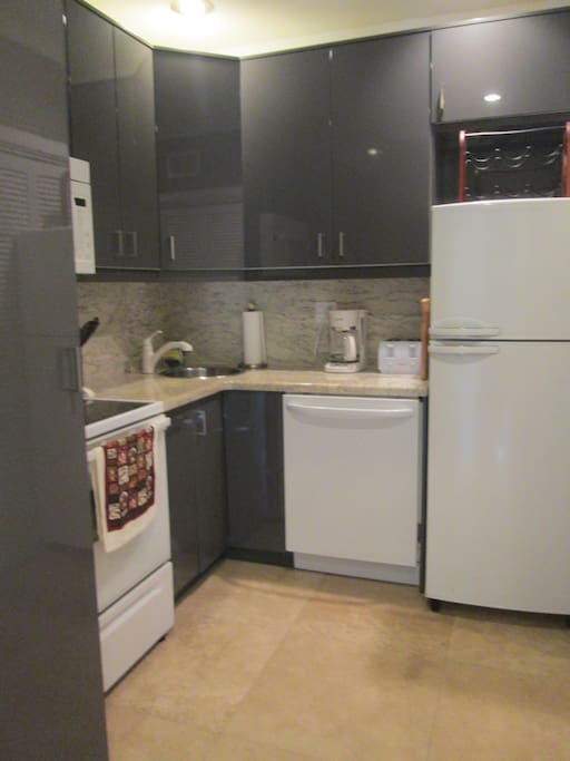 Kitchen w/ washer & dryer