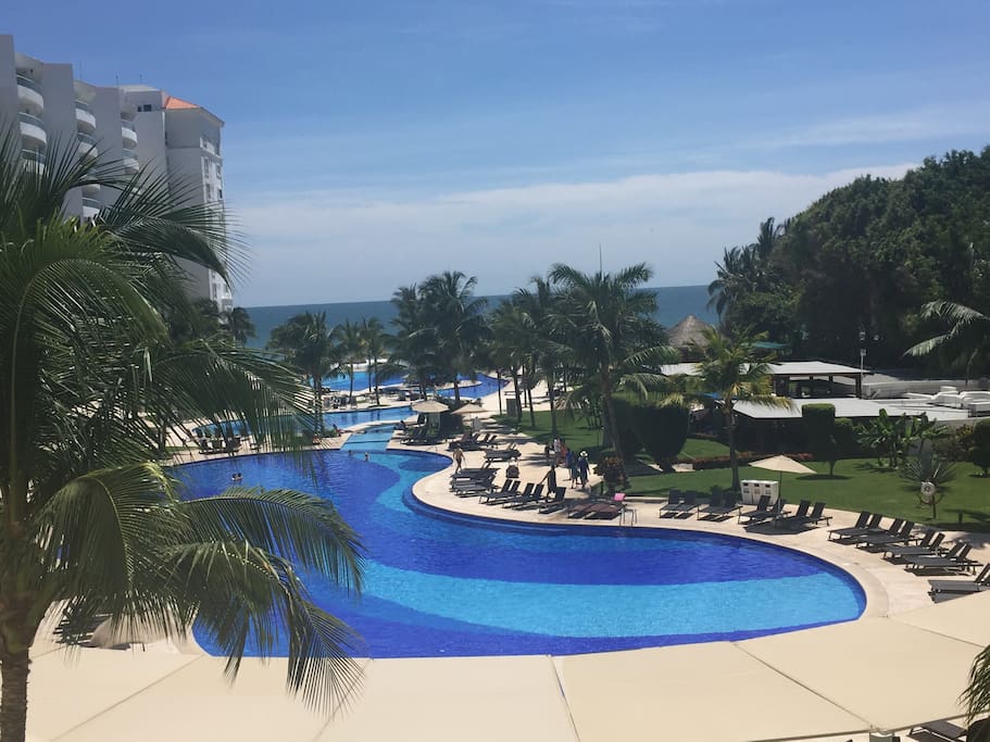 Pool, Ocean, and Palm Trees. Come make your own memories!