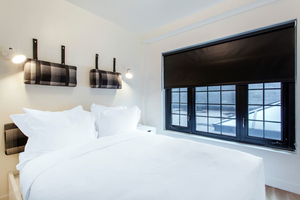 Leather Trimmed Cushions, Frette Linen, Down Pillows and Cozy Down Comforter