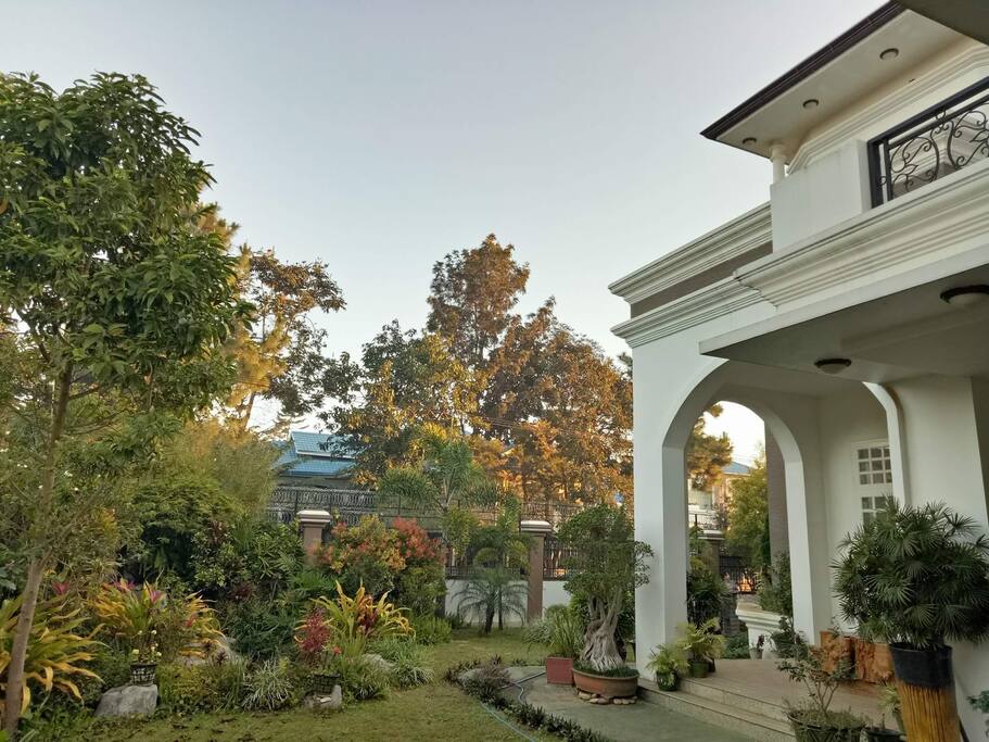 All around the house there is lush greenery and a great view. This house has its own garden and private lawn with some fish in the pond.