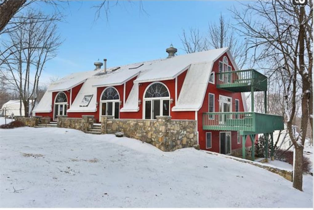 Beautiful converted barn house with tons of outdoor space.