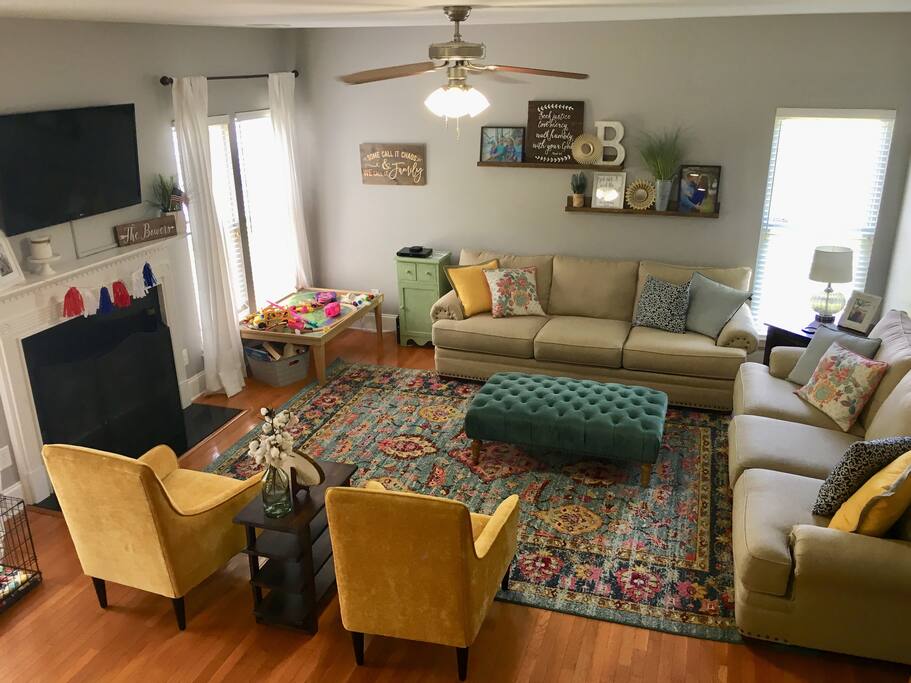 Large living area with satellite tv, Apple TV, and DVD player