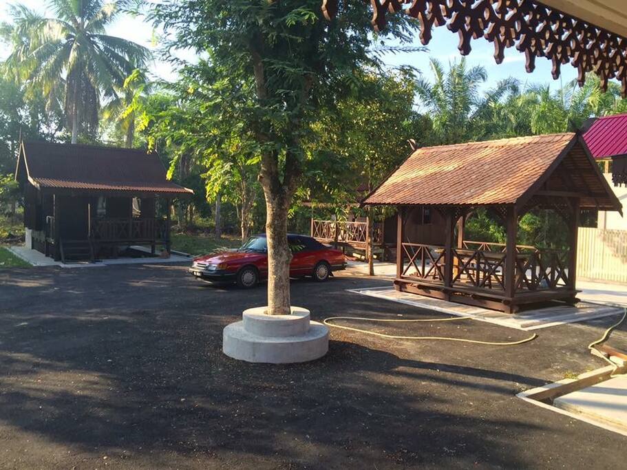 The Couple Chalet and the Single Chalet in the background with The Waqaf (gazebo) on the left