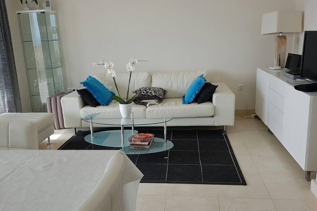 Living room is a cosy place with dining table. Through big sliding doors you step to the large balcony. The apartment has WiFi, satellite TV and radio.