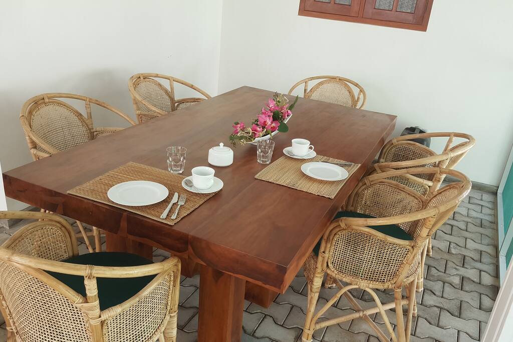 dining table in the screened-in patio