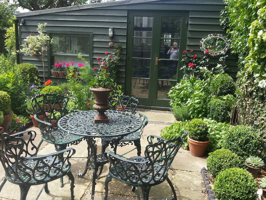 feels free to sit and enjoy our garden