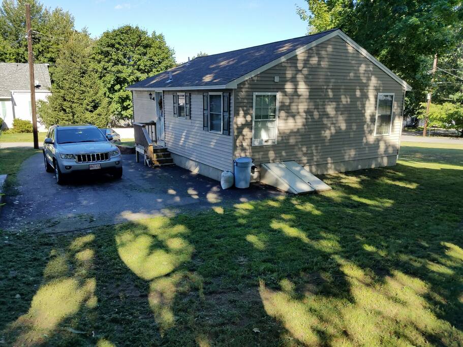 Driveway holds up to 7 cars.