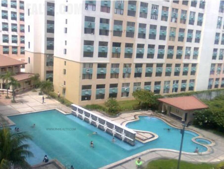 Guests can enjoy the pool and gym facilities inside the village