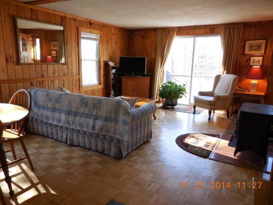 sofa facing the sliders and the mountains