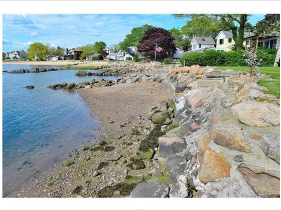 Private beach steps from backyard.