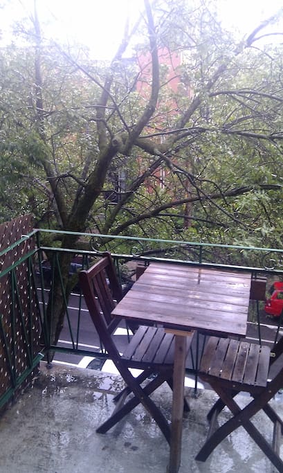 Peaceful balcony, on a quiet street.