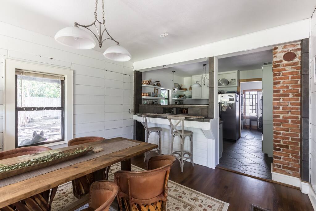 Access to shared dining space. Or just a good spot to marvel at that exposed brick