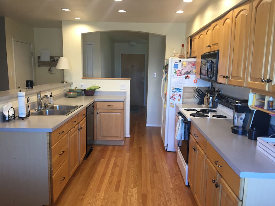 Kitchen opens to living area. Great for staying connected while you cook.