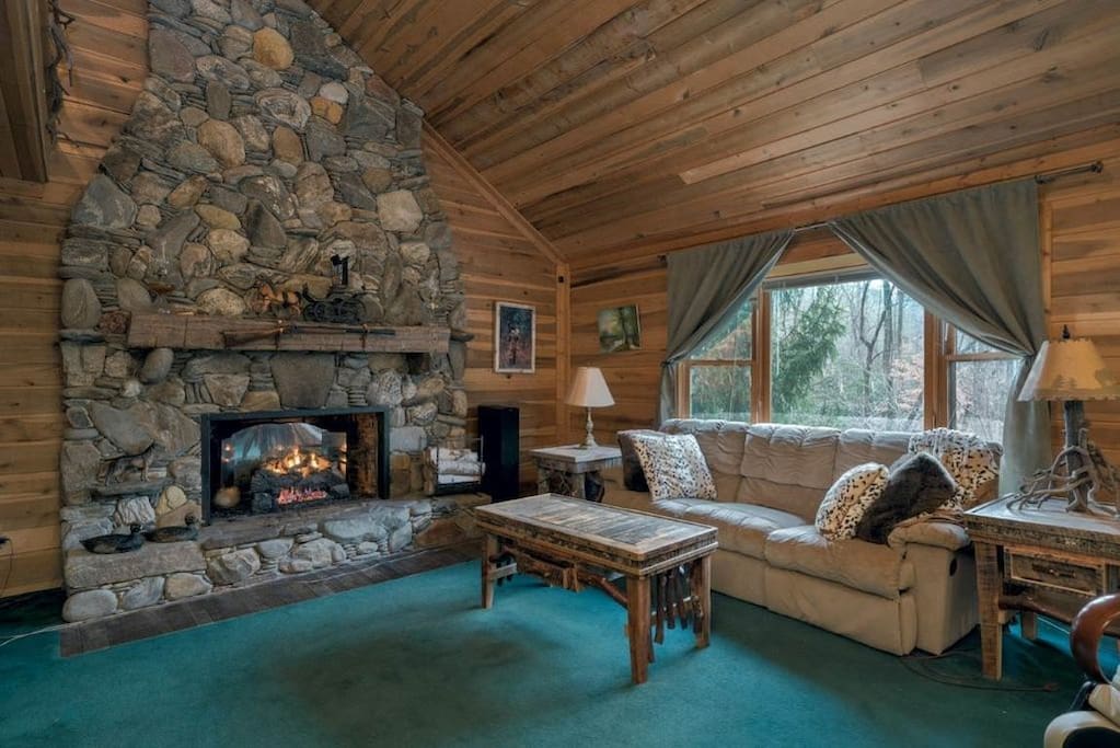River rock Fireplace with propane logs