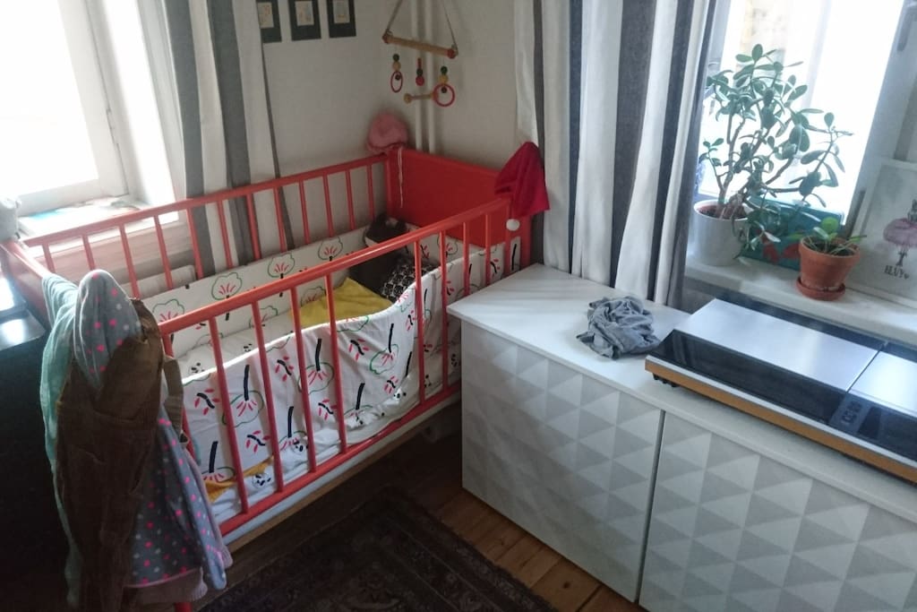 Children's bed and plenty of toys are available.
