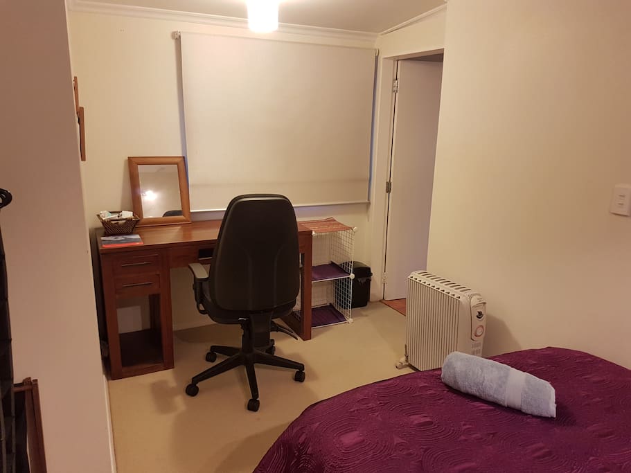 Bedroom with work desk