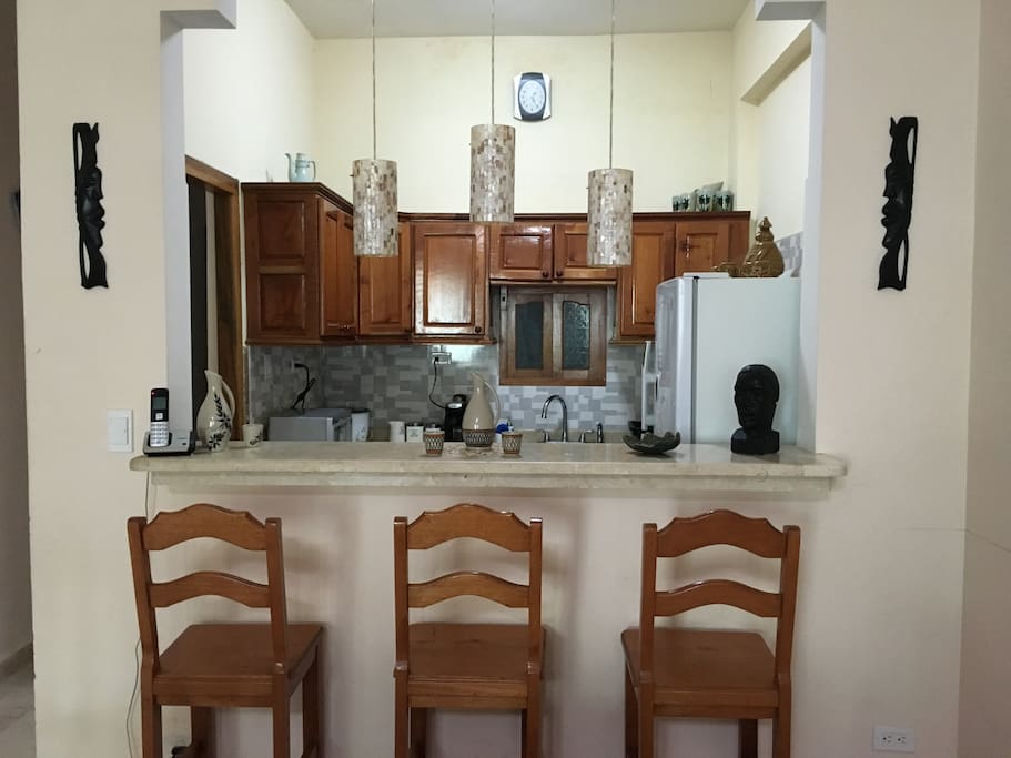 Inviting Bar with marble counter tops