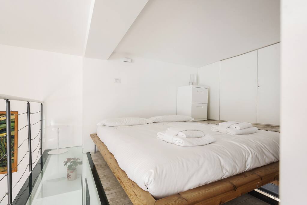 The Bedroom - The comfortable double bed with soft bed-linen and towels