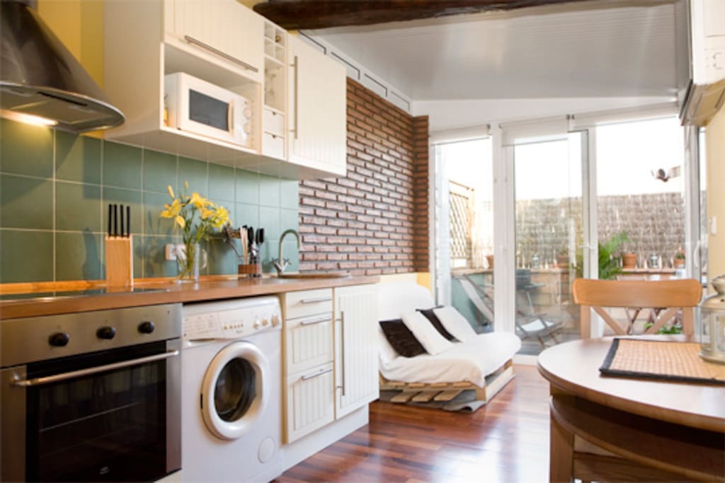 The kitchen / living room with direct access to the lovely terrace