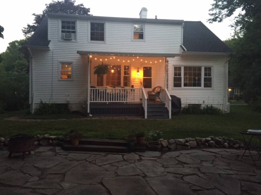 back yard with covered porch and grill
