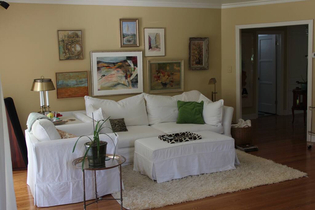 California Comfortable Great Room with 8 foot down couch, oversized chair and ottoman
with Remote Controlled Gas Fireplace
