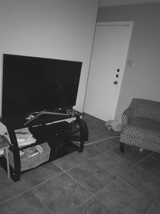 50 in flat screen tv, one of the 4 tvs in the home
