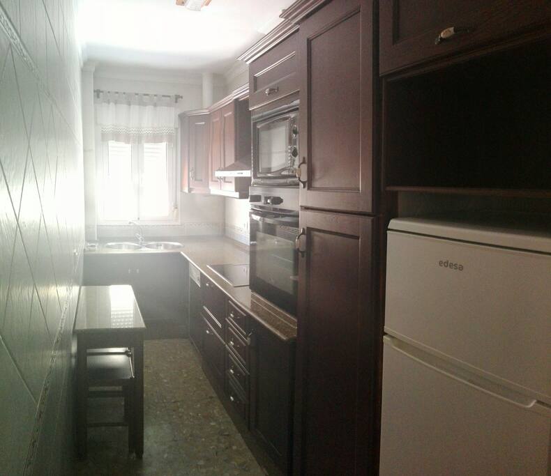 la cocina totalmente equipada
