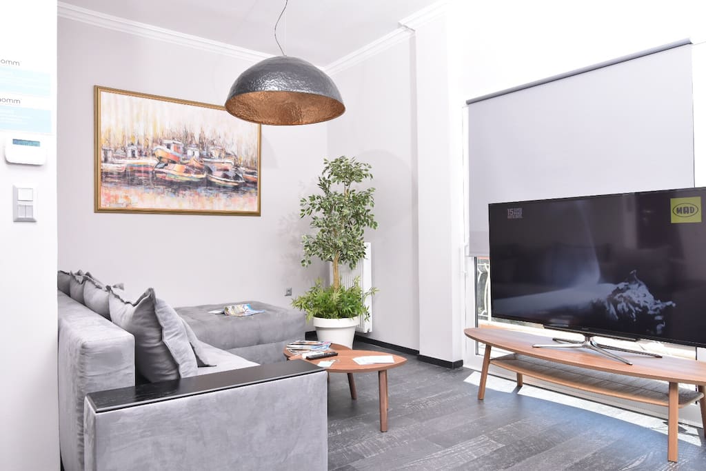 Modern living room with TV 70"