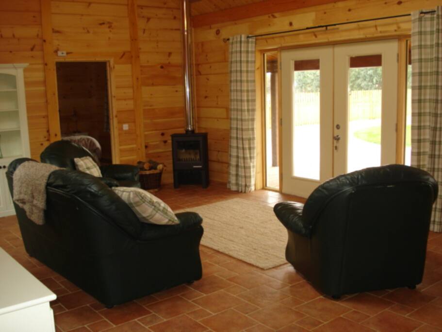 Living space with Woodburner and TV