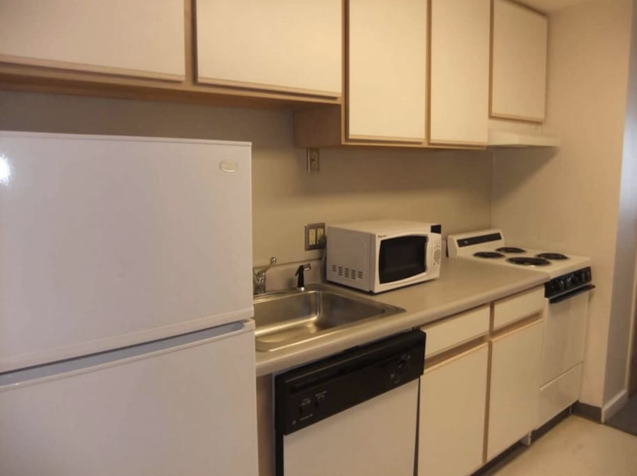 Kitchen includes a fridge, microwave, dishwasher, stove, oven, etc.