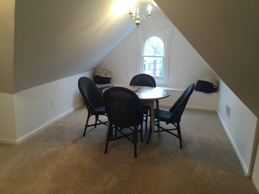 Attic playroom with sleeping area for four