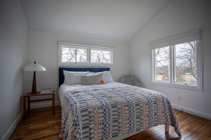 Guest bedroom # 2 with queen bed.