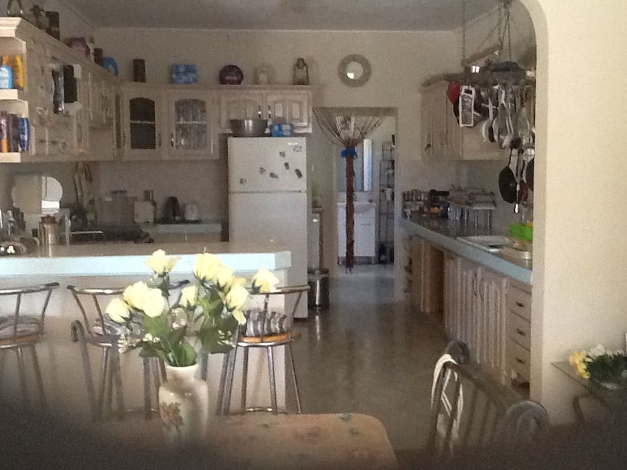 Kitchen , breakfast bar dining room utility room . Secure Storage for bikes.