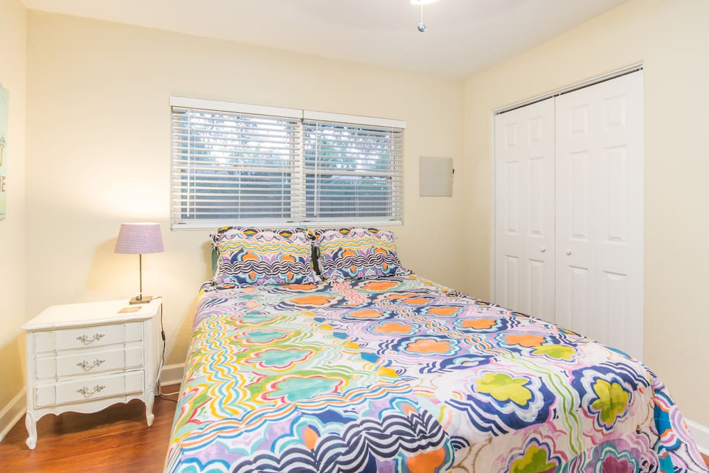 The queen-sized bed and soft quilt await.