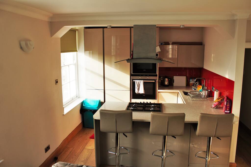 Modern American kitchen with washer and oven