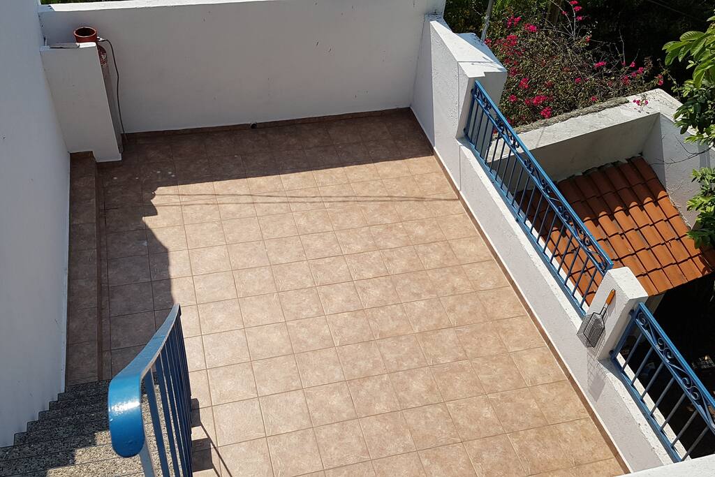 Looking down at terrace from rooftop