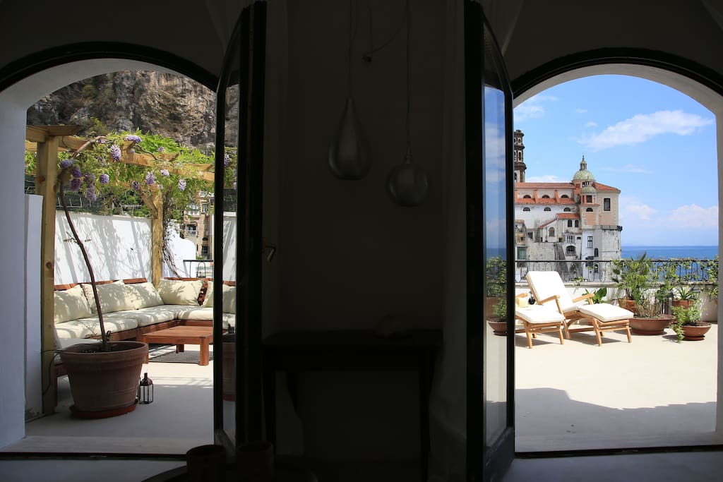 The living room has direct access to the terrace