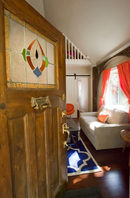 Antique stained glass oak door with old time mail slot and ringer.