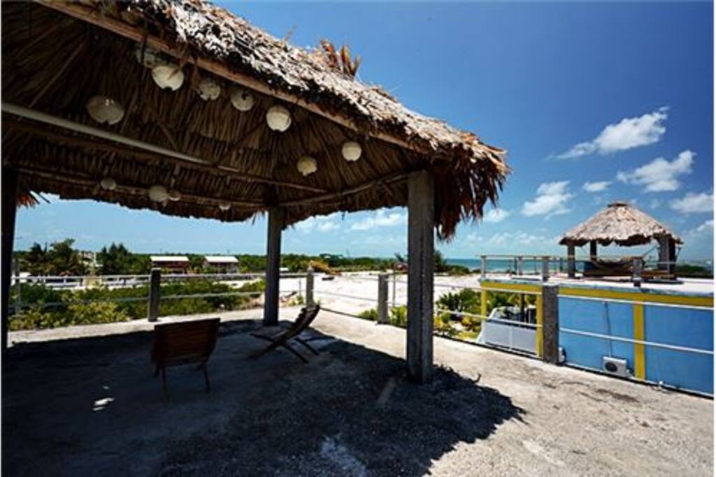 Roof top has palapa and great views of sea and sunset