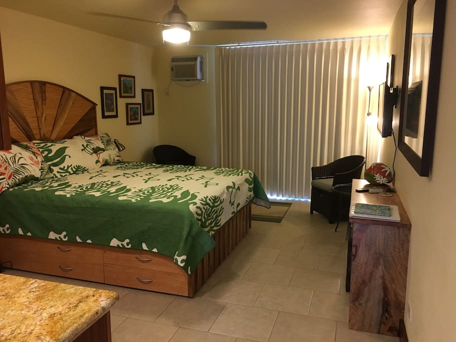 Black out curtains, air-conditioning, king bed with storage.