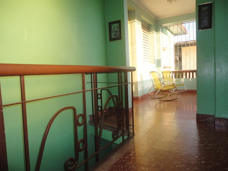Entrance to the house and the balcony (common area).