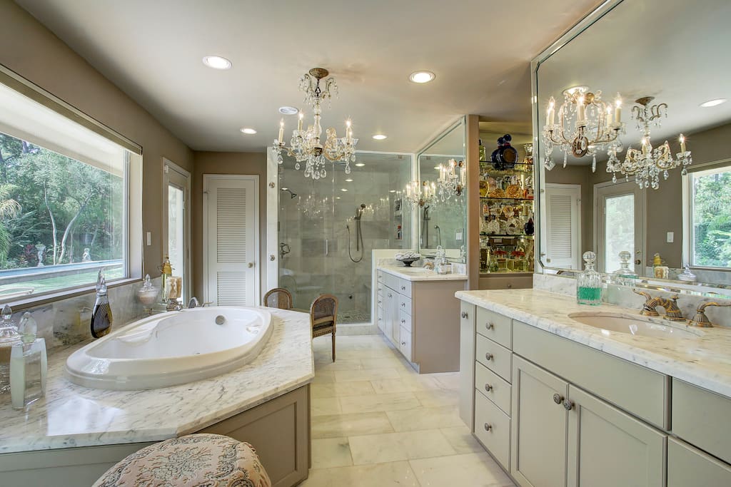 Master bath with a Huge 2 person shower and view of backyard and private patio