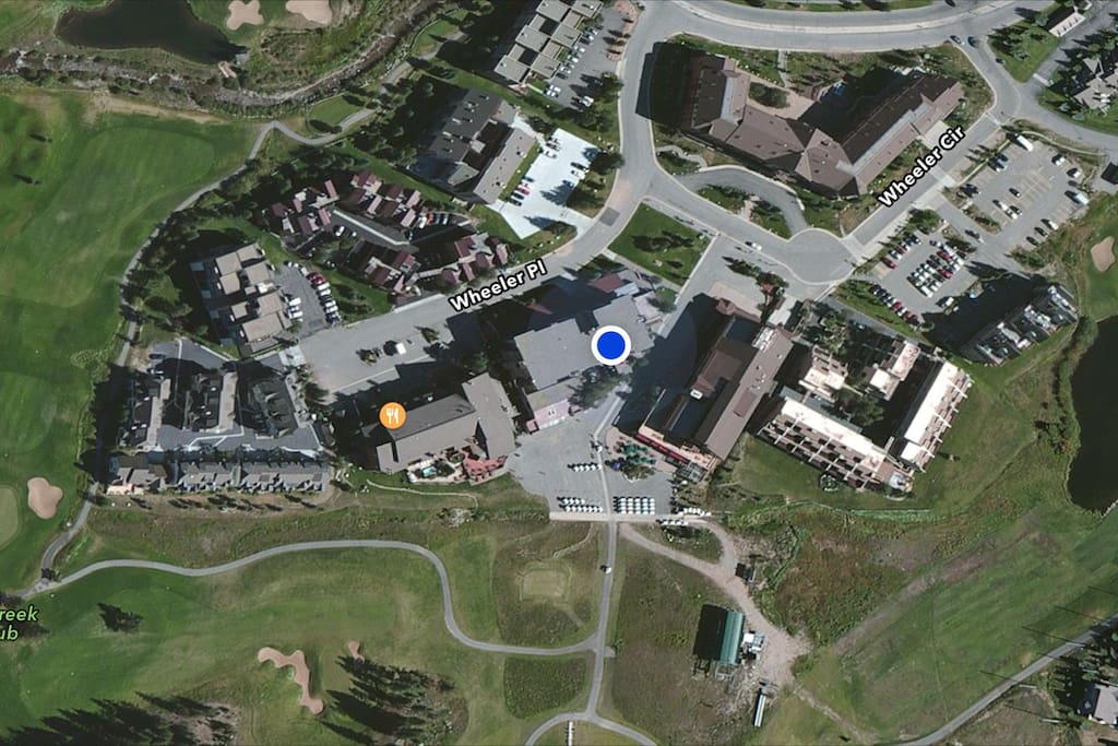 Blue dot indicates location of condo.