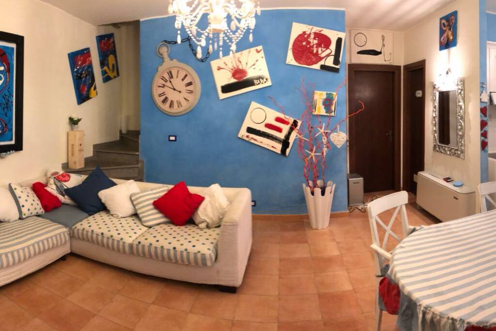 living room equipped with LED TV with satellite connection.